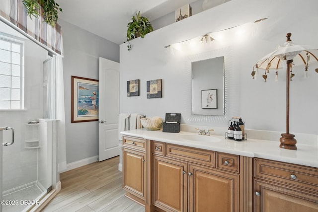 109 Edward Dr, Palm Coast, FL 32164 - full bath featuring vanity, a shower stall, and wood finished floors