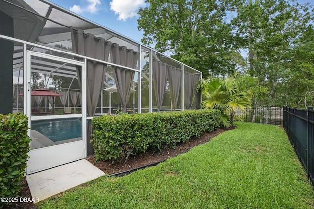 109 Edward Dr, Palm Coast, FL 32164 - fenced backyard featuring a lanai