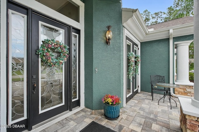109 Edward Dr, Palm Coast, FL 32164 - view of exterior entry with stucco siding