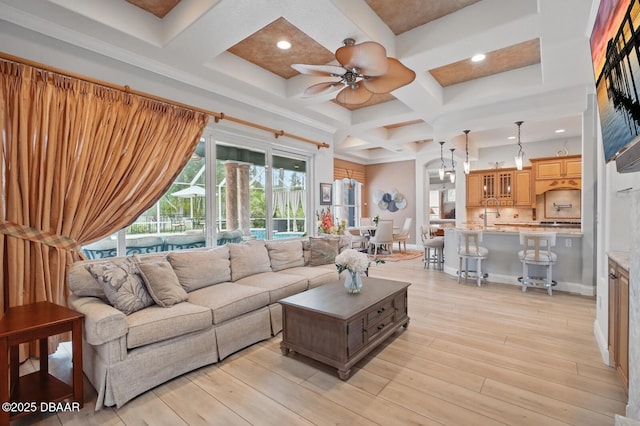 109 Edward Dr, Palm Coast, FL 32164 - living area with coffered ceiling, a ceiling fan, beam ceiling, light wood-style flooring, and recessed lighting