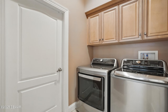 109 Edward Dr, Palm Coast, FL 32164 - laundry room featuring washer and dryer and cabinet space