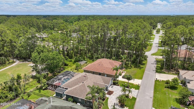 109 Edward Dr, Palm Coast, FL 32164 - aerial view of residential area featuring a heavily wooded area