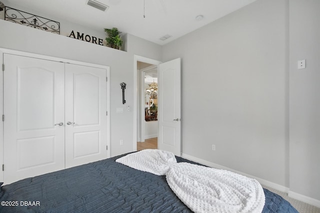 109 Edward Dr, Palm Coast, FL 32164 - bedroom with a closet and carpet flooring