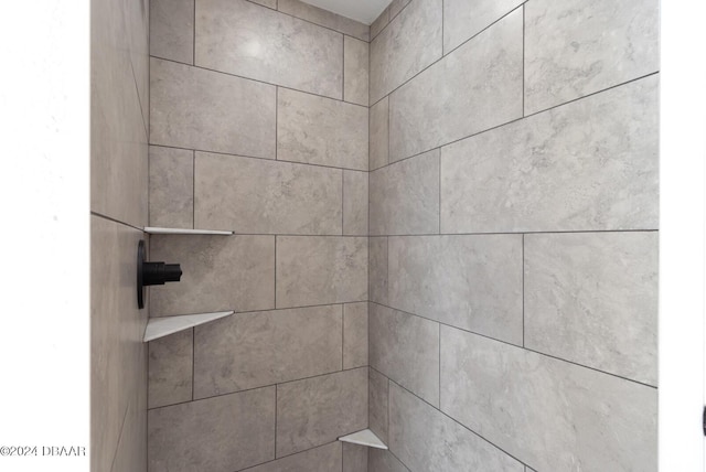 room details with a tile shower