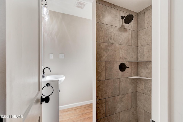 13 Highridge Rd, Daytona Beach, FL 32117 - full bath with tiled shower, wood finished floors, and vanity