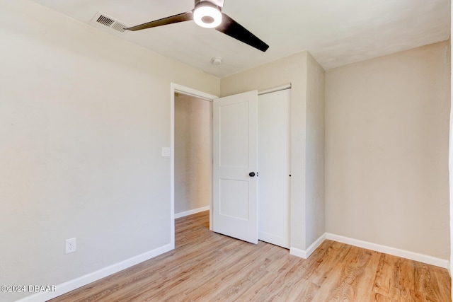 13 Highridge Rd, Daytona Beach, FL 32117 - unfurnished bedroom with wood finished floors, a closet, and ceiling fan