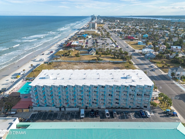 bird's eye view with a view of the beach and a water view