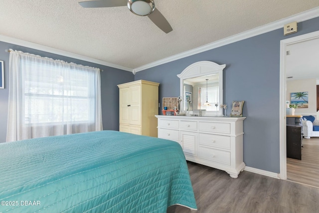 bedroom featuring a textured ceiling, ceiling fan, crown molding, and dark hardwood / wood-style flooring