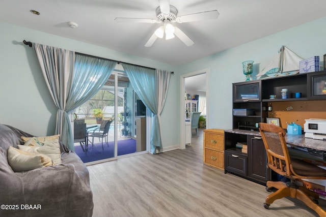 office area featuring ceiling fan and light hardwood / wood-style floors