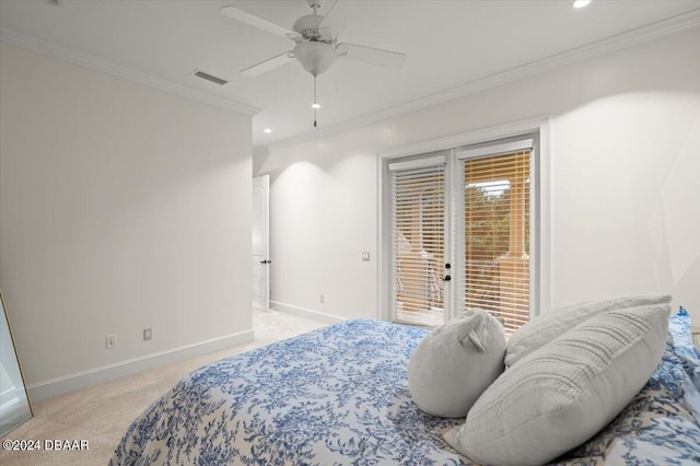 carpeted bedroom featuring access to outside, ceiling fan, and crown molding