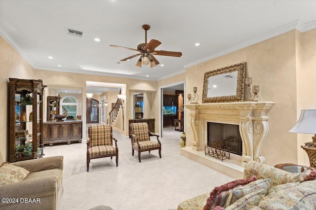 living room featuring ceiling fan and crown molding