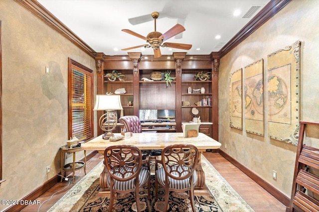 office area with hardwood / wood-style floors, ceiling fan, and ornamental molding