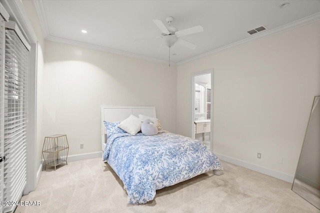 bedroom with ornamental molding, light colored carpet, and ceiling fan