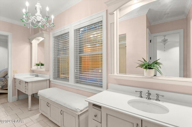 bathroom featuring ornamental molding, tile patterned flooring, vanity, and a chandelier