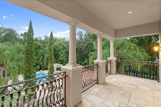 view of patio with a balcony