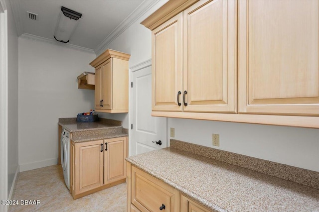 kitchen featuring ornamental molding, light brown cabinets, light tile patterned flooring, and washer / dryer