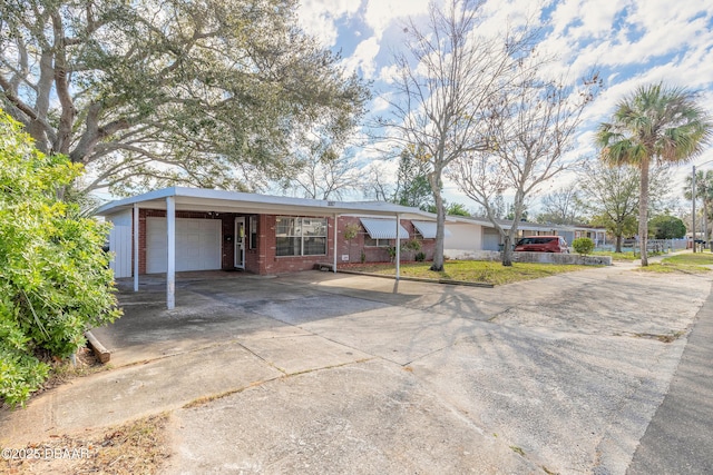 ranch-style house featuring a garage