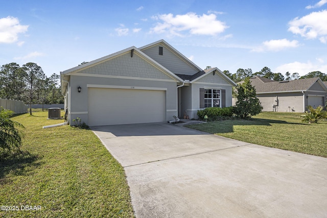 view of front facade featuring central air condition unit, driveway, a garage, and a front lawn