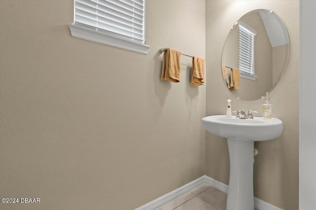 bathroom with tile patterned flooring