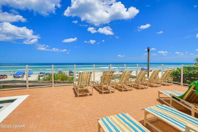 property view of water featuring a beach view