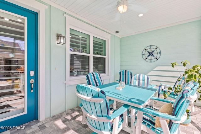 view of patio featuring ceiling fan