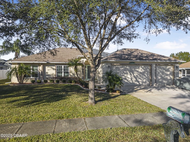 ranch-style home featuring a front yard and a garage