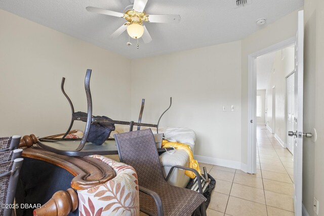 1518 Franklin Cir, Holly Hill, FL 32117 - dining room with light tile patterned flooring, ceiling fan, and baseboards