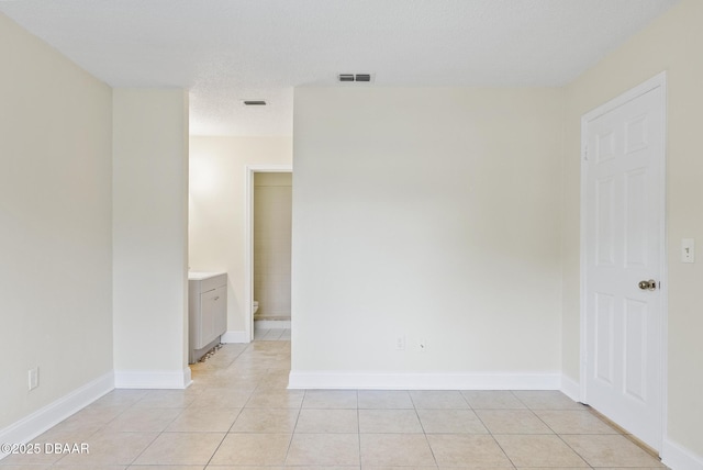 1518 Franklin Cir, Holly Hill, FL 32117 - empty room with light tile patterned floors and baseboards