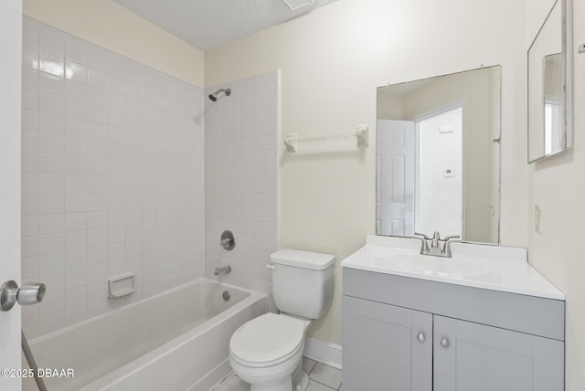 1518 Franklin Cir, Holly Hill, FL 32117 - bathroom with toilet, washtub / shower combination, a textured ceiling, vanity, and baseboards