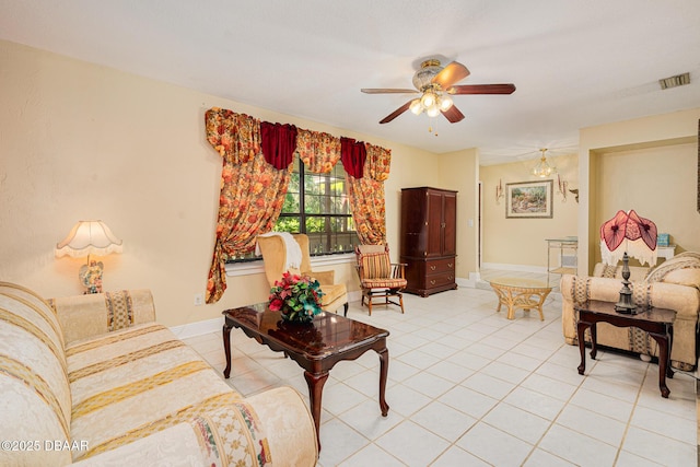 tiled living room featuring ceiling fan