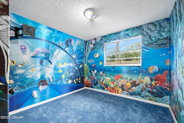 600 Holmes Ave, Daytona Beach, FL 32114 - recreation room featuring wallpapered walls, a textured ceiling, and carpet floors