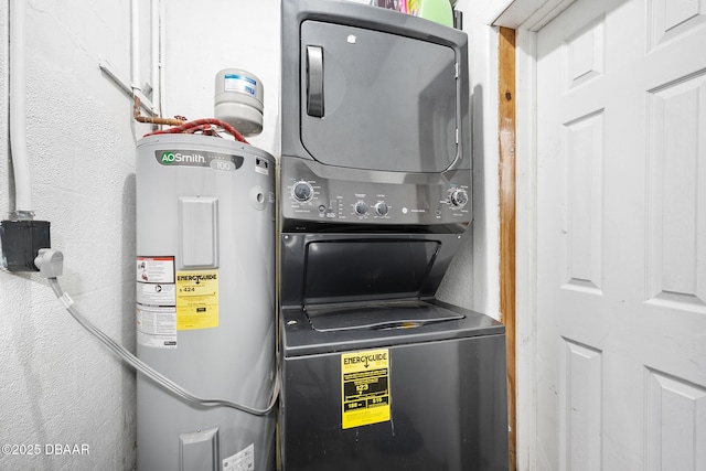 600 Holmes Ave, Daytona Beach, FL 32114 - washroom featuring electric water heater and stacked washer / dryer