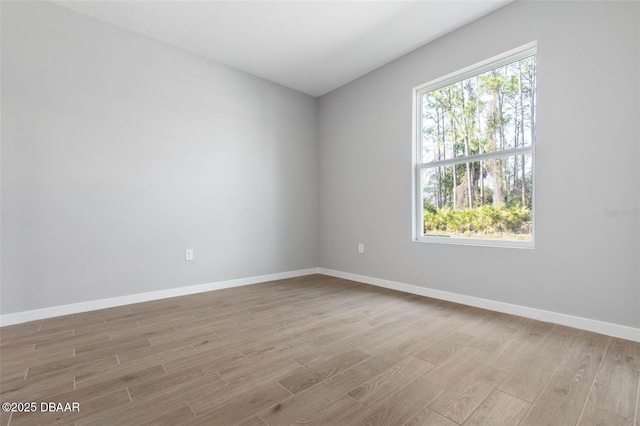23 Weymouth Ln, Palm Coast, FL 32164 - spare room with wood finished floors