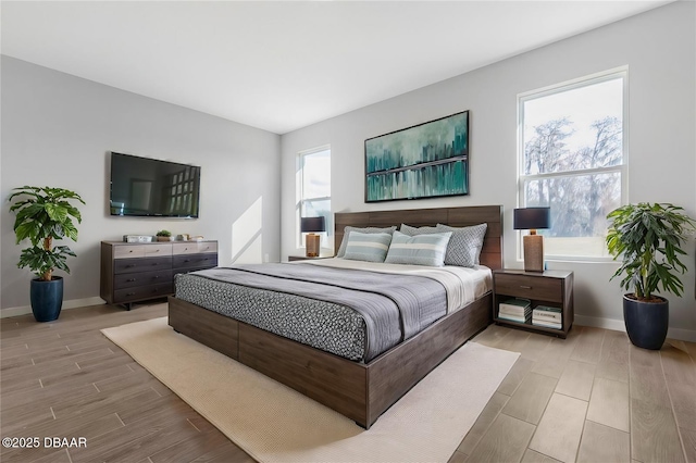 23 Weymouth Ln, Palm Coast, FL 32164 - bedroom featuring light wood finished floors and baseboards
