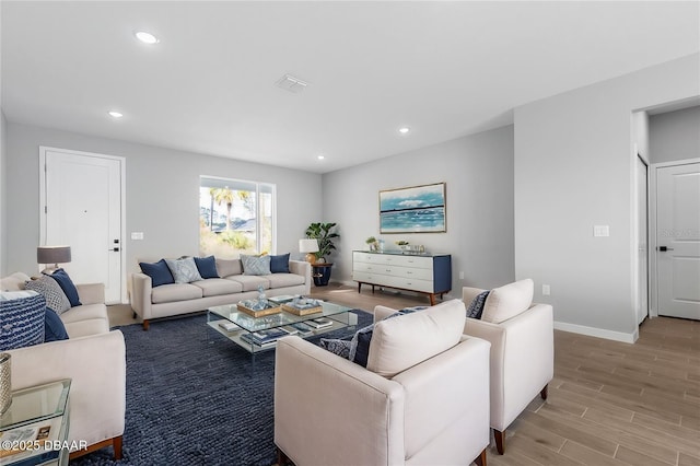 23 Weymouth Ln, Palm Coast, FL 32164 - living area featuring wood finished floors and recessed lighting