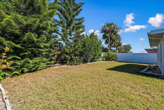 view of yard with fence