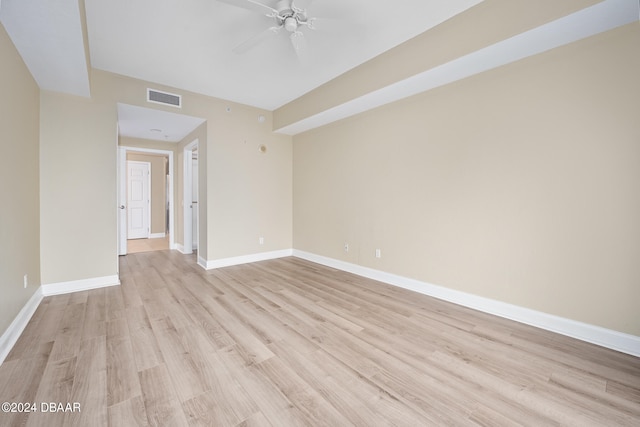 unfurnished room featuring ceiling fan and light hardwood / wood-style floors