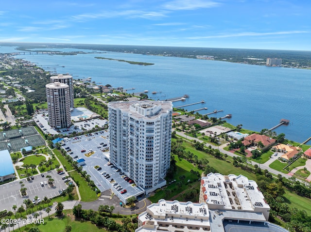 birds eye view of property with a water view