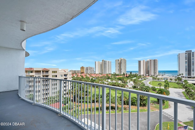 balcony featuring a water view