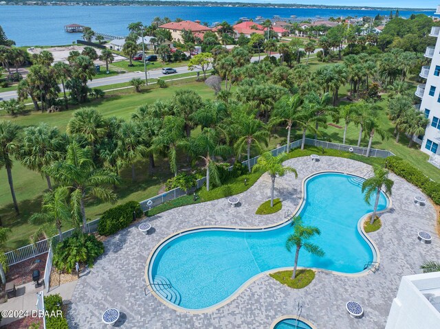 2 Oceans W Blvd Unit 707, Daytona Beach, FL 32118 - community pool featuring fence and a water view