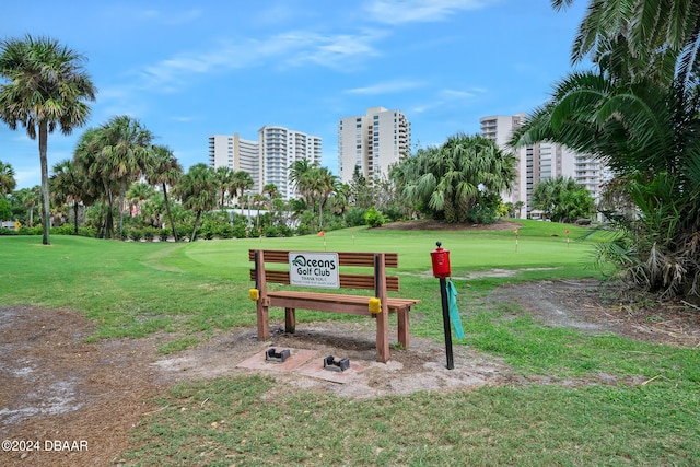 view of home's community featuring a yard