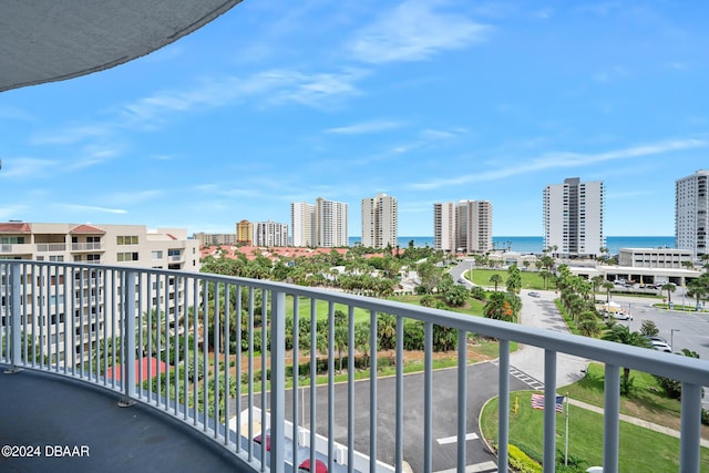 balcony featuring a water view