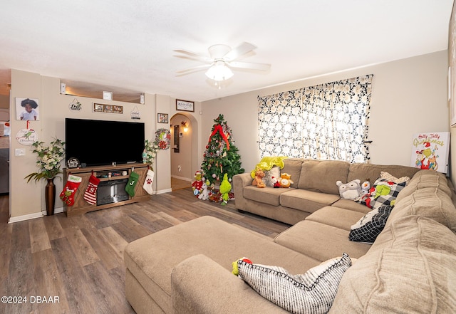 living room with hardwood / wood-style floors and ceiling fan