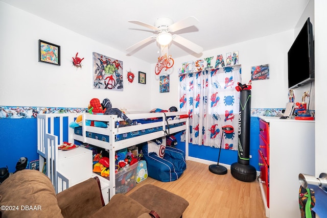 bedroom featuring ceiling fan and wood-type flooring