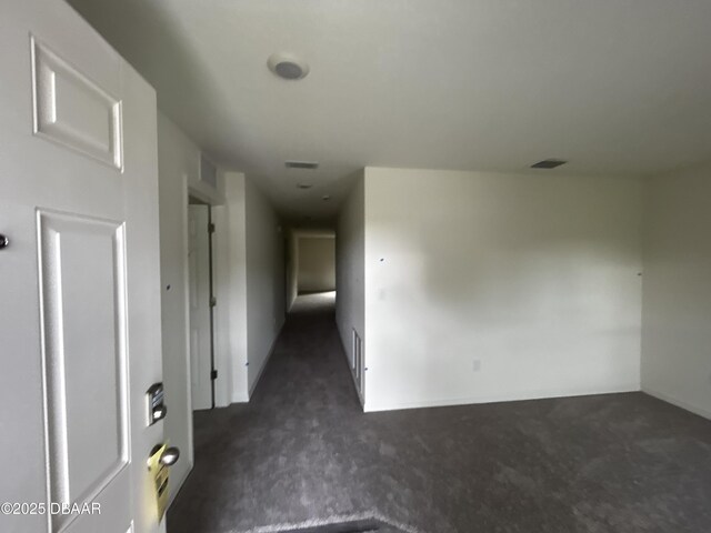 31 Palm Leaf Ln, Palm Coast, FL 32164 - corridor with dark colored carpet