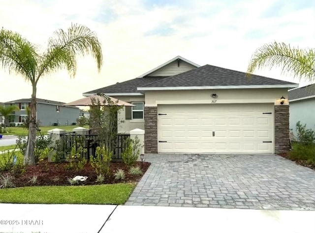 view of front of property featuring a garage