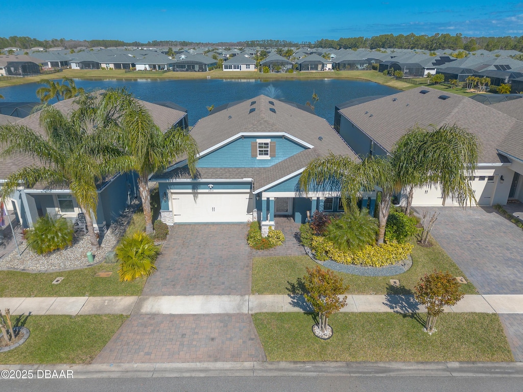 birds eye view of property featuring a water view