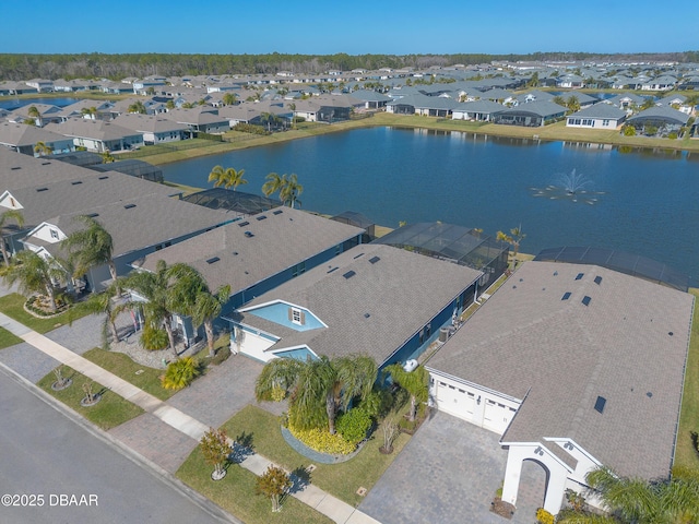 drone / aerial view with a water view