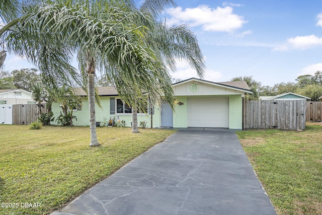 view of front of home with a garage and a front yard