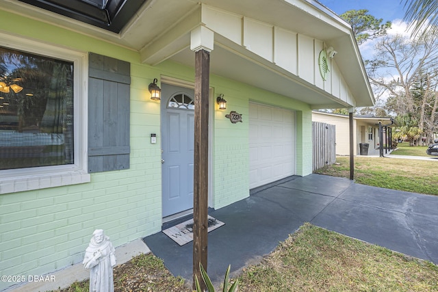 entrance to property featuring a garage